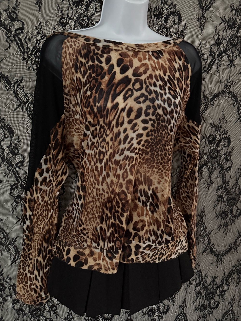 Iris Los Angeles Leopard print blouse with black mesh sleeves